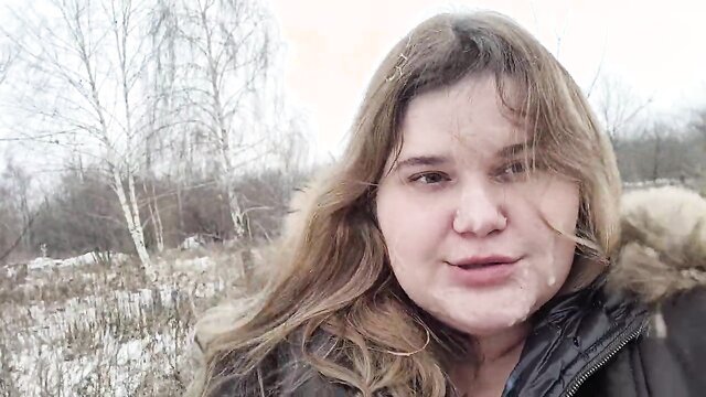 Watch a cute girl with big tits get a blowjob in the snow
