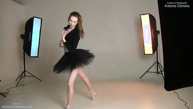 Karolina L, the flexible ballerina, tantalizes in a black stage costume