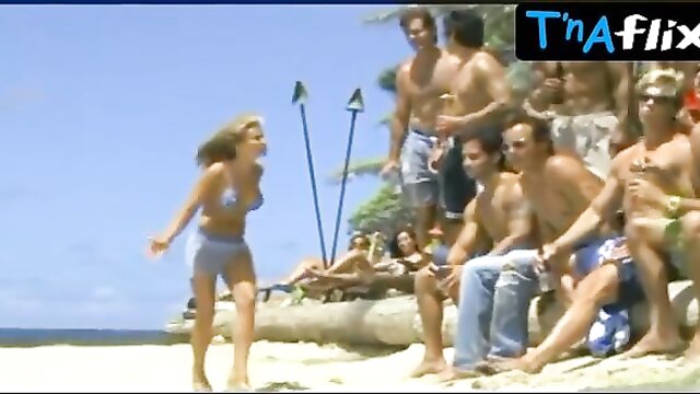 Pamela Anderson in a bikini on the beach in Baywatch: A sunny vacation