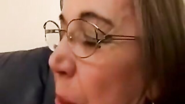 Mature woman with glasses enjoys masturbation and oral sex