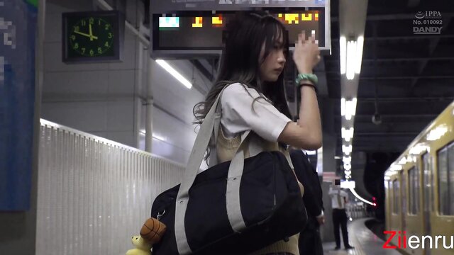 Japanese teen gives footjob in public train